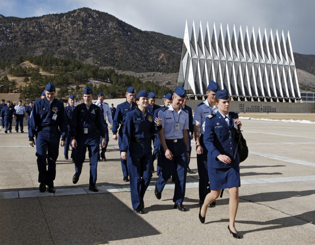 In this Friday, Jan. 20, 2012 photo cadets walk the campus at the Air Force Academy near Colorado Springs, Colo., on their way to the dinning hall for lunch. (AP Photo/Ed Andrieski)