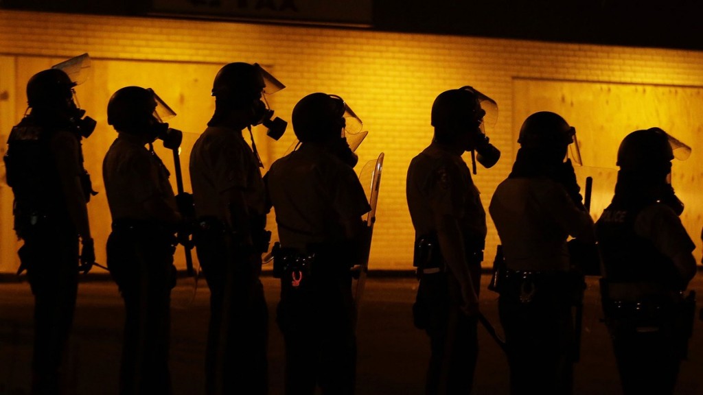 Police-in-Ferguson.Charlie Riedel, AP